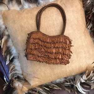 Copper colored beaded evening handbag